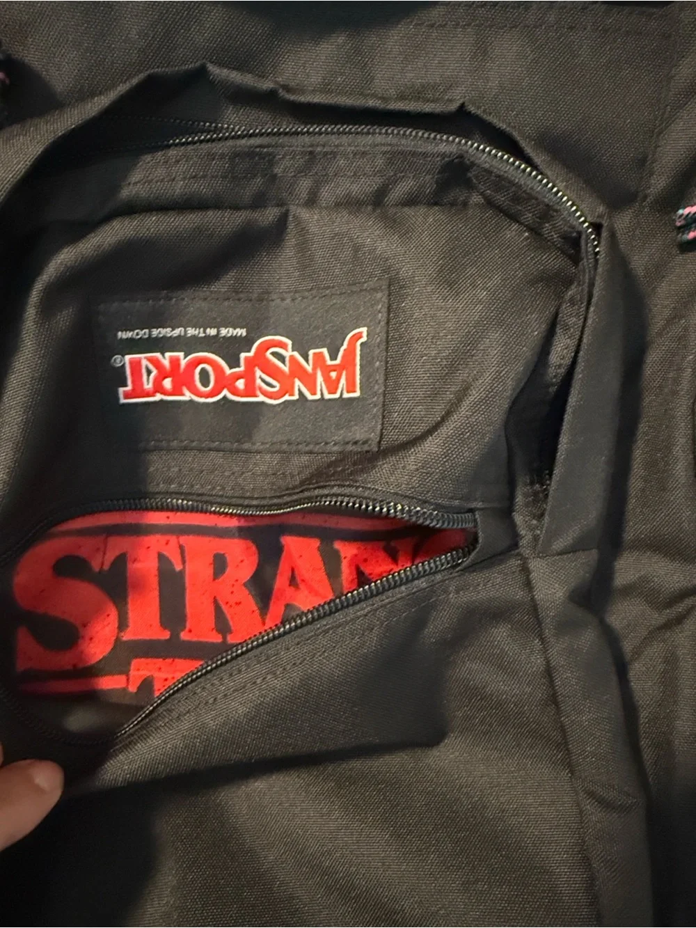 Jansport Black Backpack with Brown Base and Red Logo